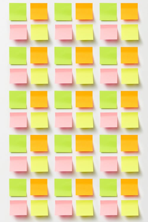 Sticky Note Pad Papers on White Surface