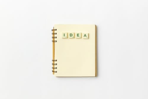 Free Spiral Notepad on White Background
 Stock Photo