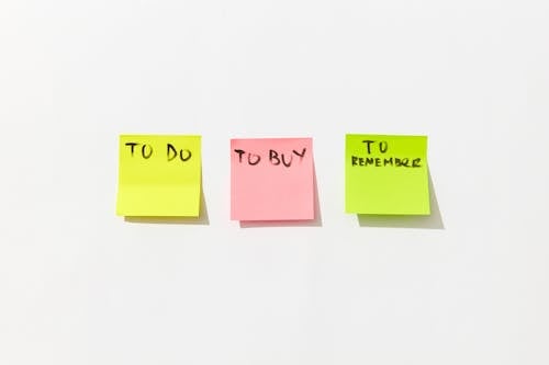 Free Sticky Notes with Messages on White Background Stock Photo