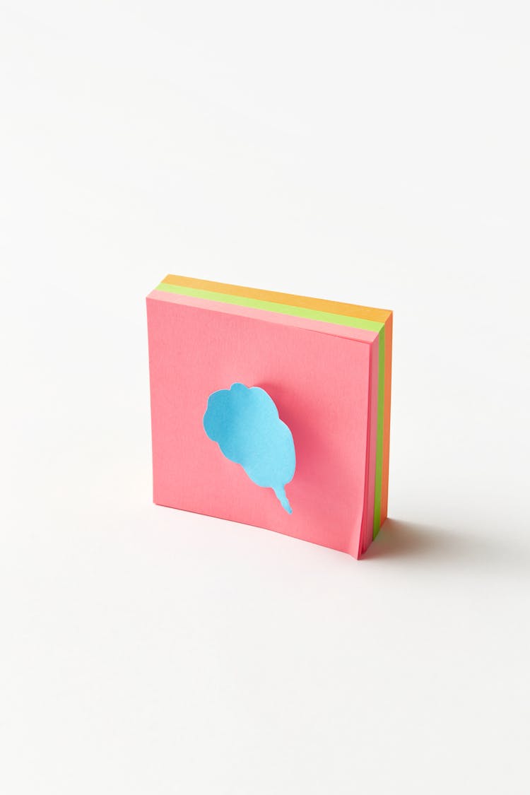 Assorted Colors Of Sticky Notepad On White Surface