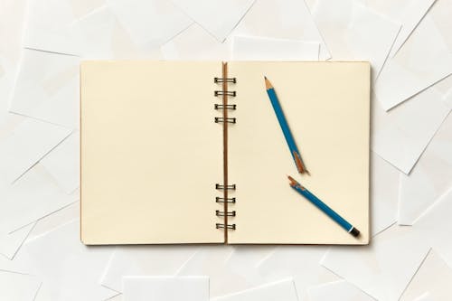 Foto profissional grátis de bloco de anotações, caderno, em branco