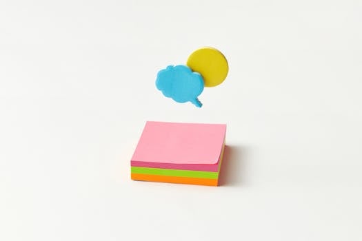 Brightly colored sticky notes with floating speech bubble cutouts on a white background.