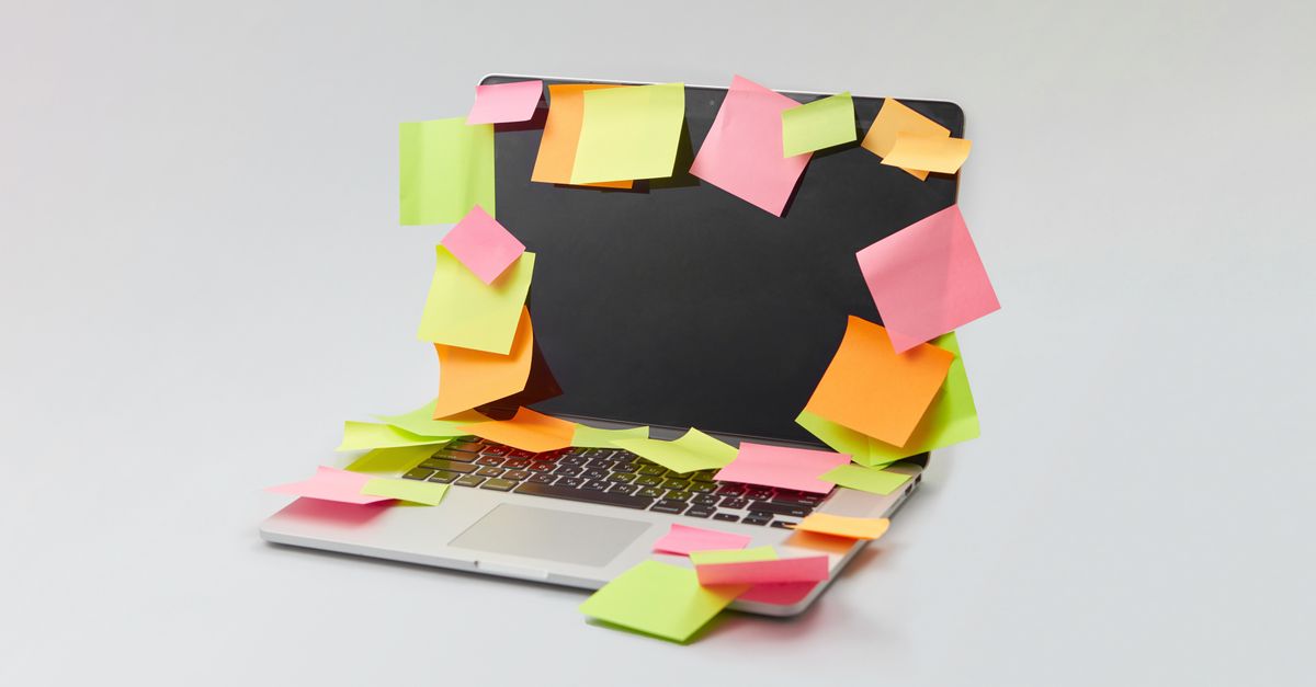 colorful content strategy board with sticky notes and a laptop