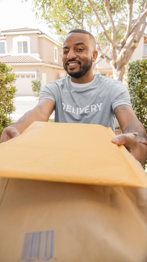 Free A Man Delivering Packages  Stock Photo