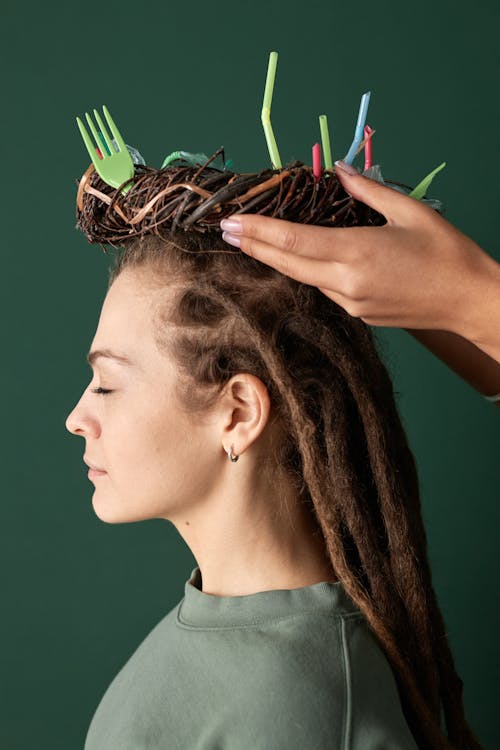 Woman Being Crowned with a Crown with Plastic Waste 