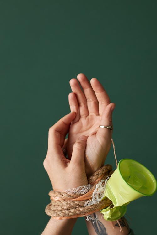 Close Up Shot of Tied Hands