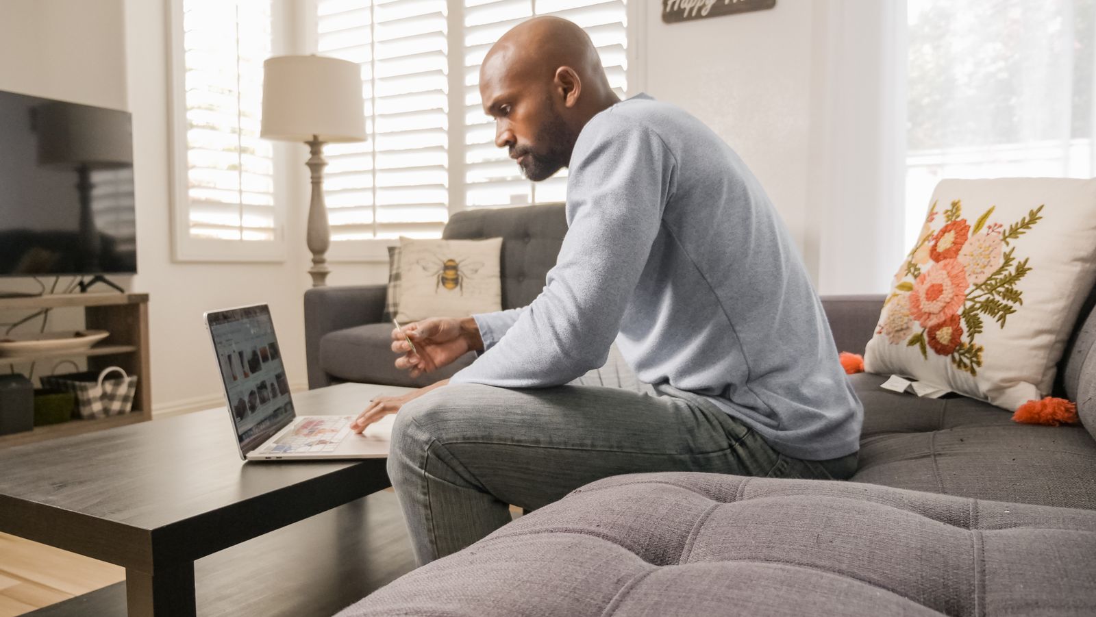 Black entrepreneur using laptop for an online business