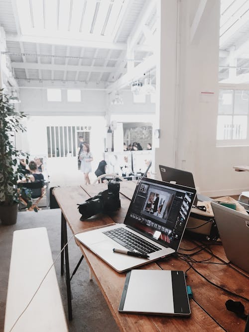 Free Turned-on Gray Laptop Computer on Table Stock Photo