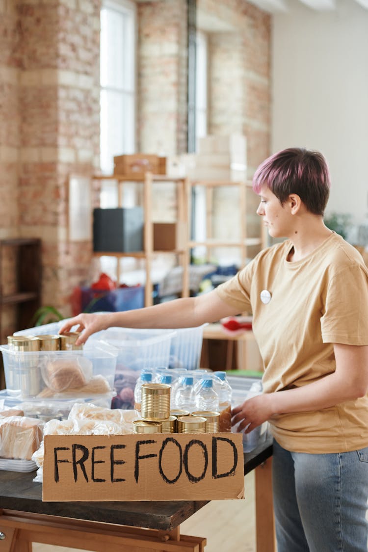 A Woman Sorting Donations