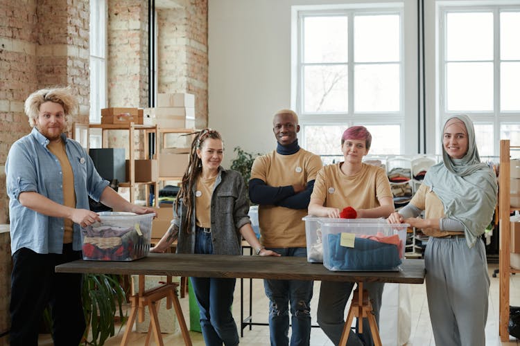 
Volunteers In A Loft With Donations