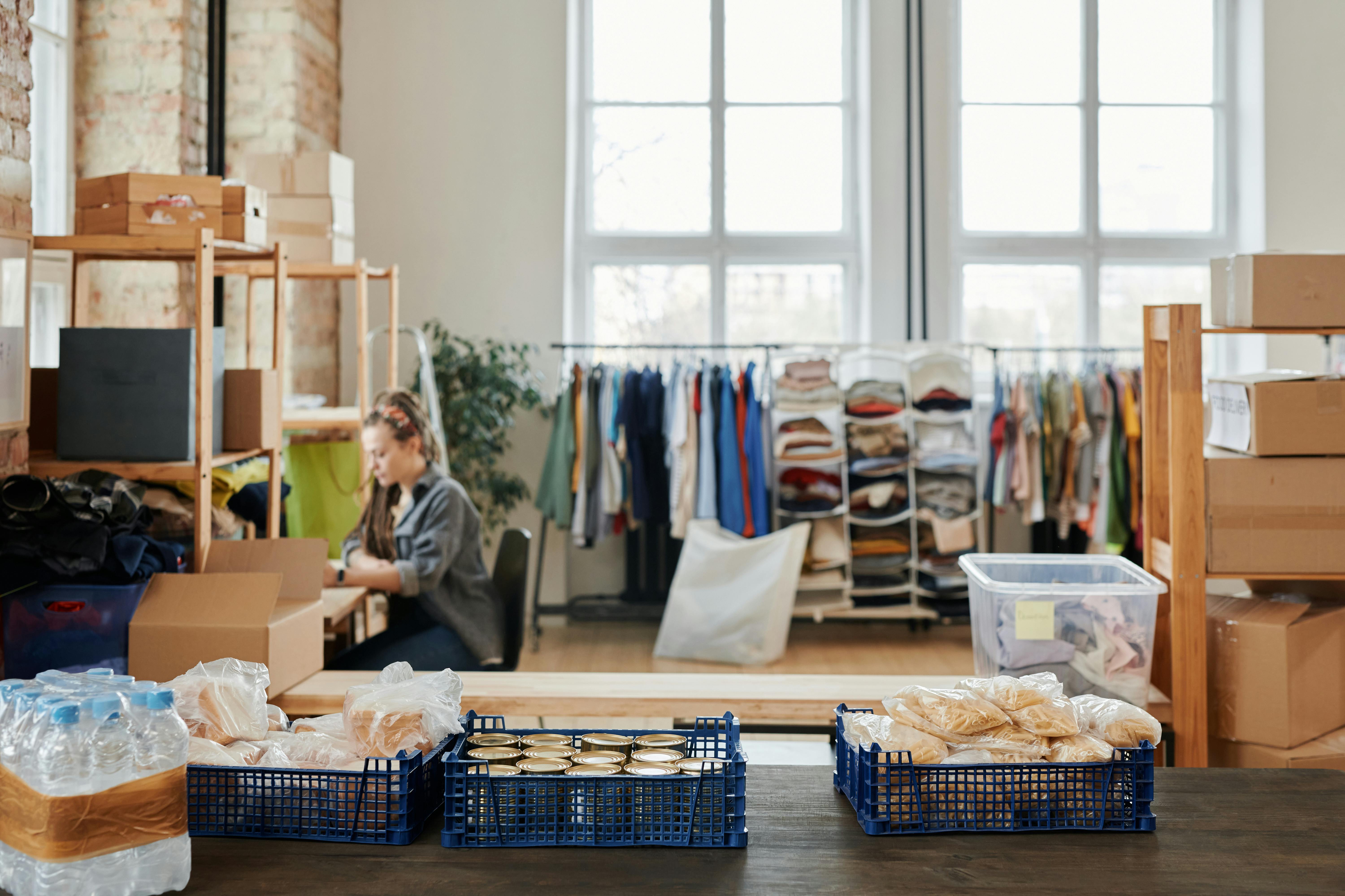 Neatly folded clothes and supplies on shelves
