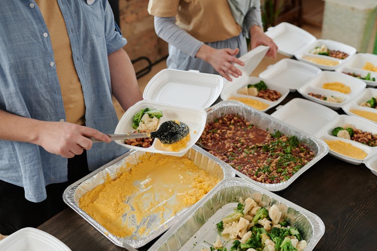 People Preparing Food Packs