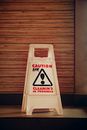 White warning sign on floor