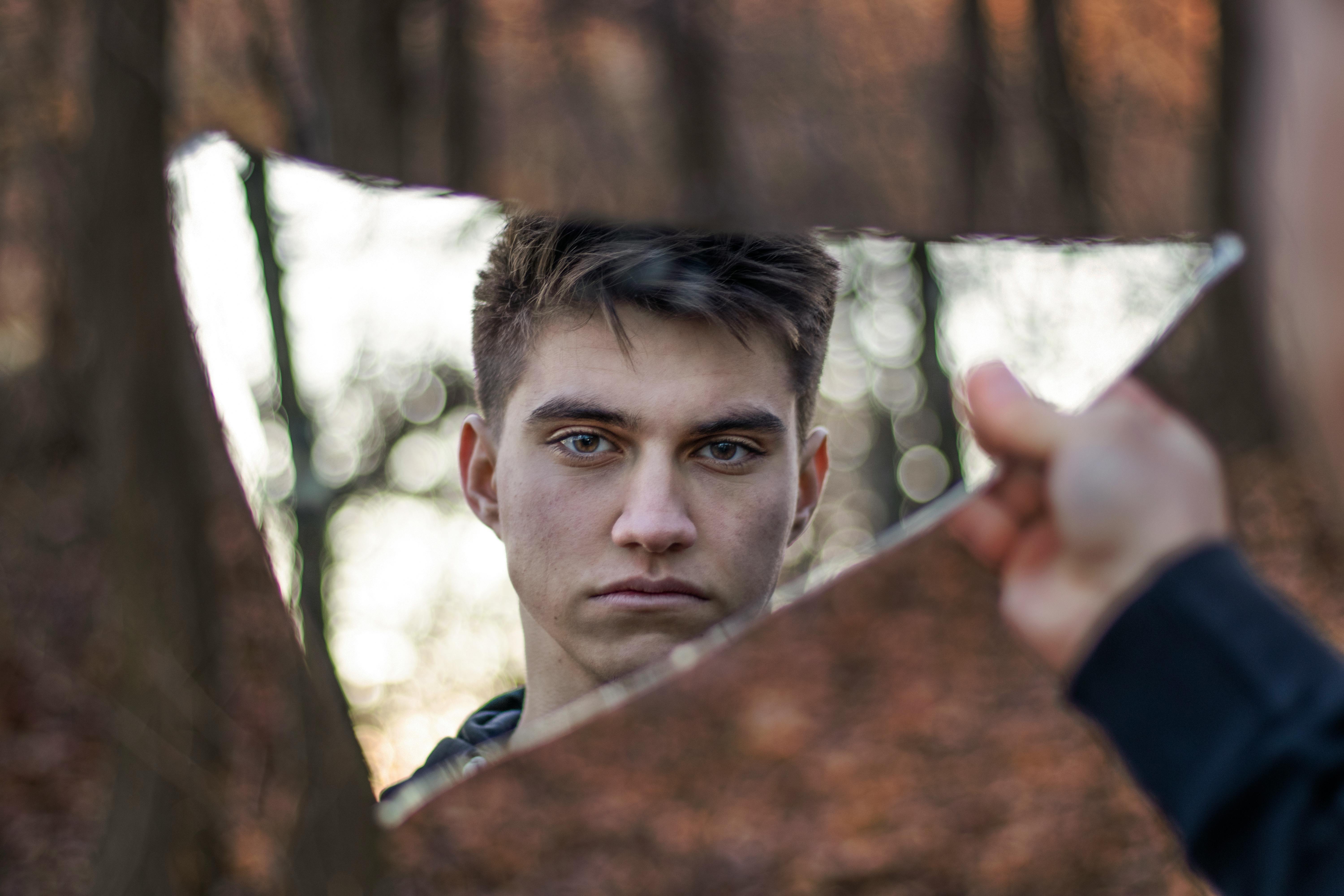 reflection of a man in the mirror