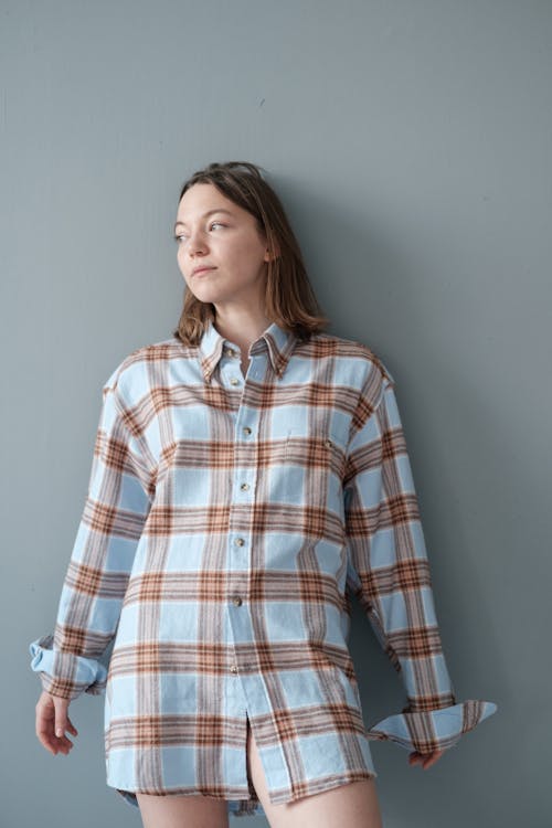 Woman in Blue White and Red Plaid Button Up Long Sleeve Shirt