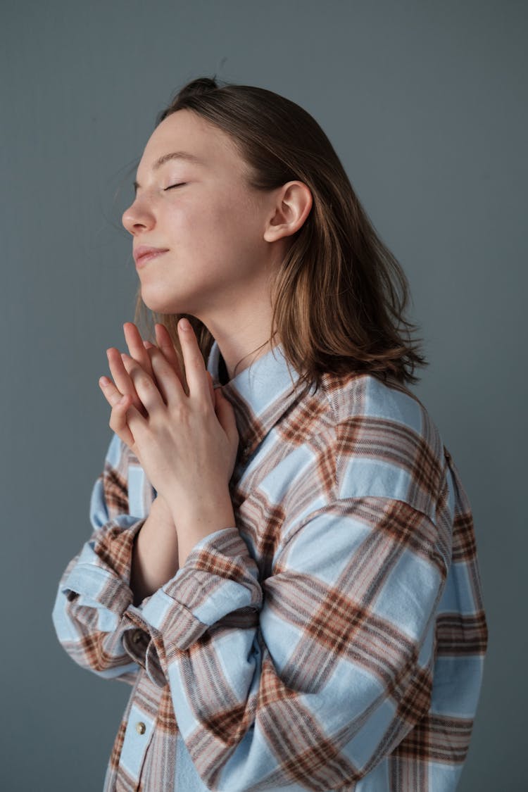 A Woman Wearing Plaid Shirt