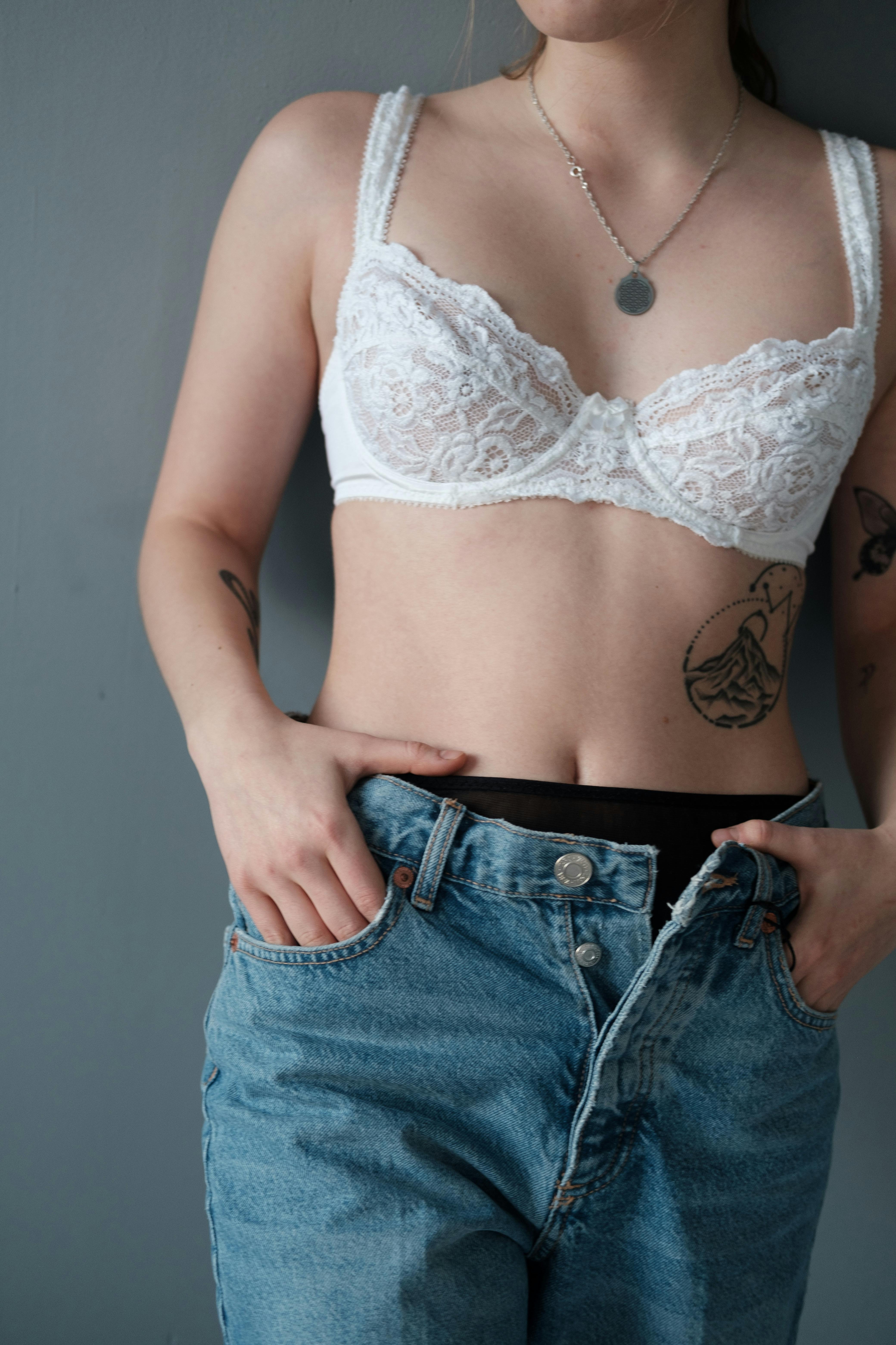 Femininity Brafitting Underclothes Concept Attractive Slim Woman Trying New  Underwear Stock Photo by ©Anetlanda 199895114