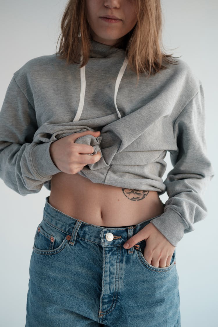 Crop Woman With Bare Tummy And Hoodie