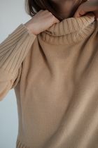 Oat ribbed roll-neck knit, photo by Alena Shekhovtcova on Pexels