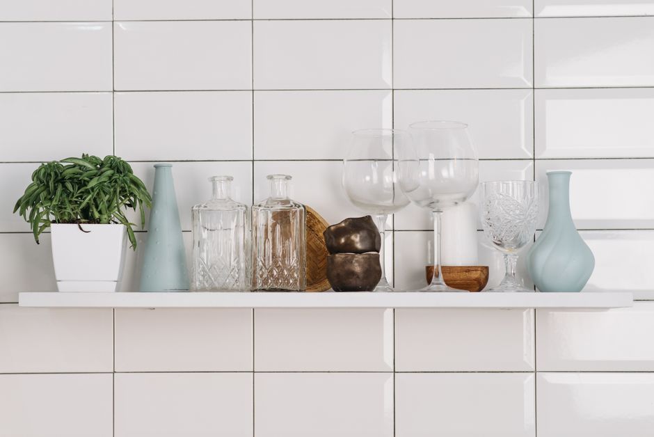 a shelf vignette demonstrating the rule of threes and varied heights - modern shelf styling a shelf vignette demonstrating the rule of threes and varied heights - modern shelf styling