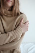 Oat ribbed roll-neck knit, photo by Alena Shekhovtcova on Pexels