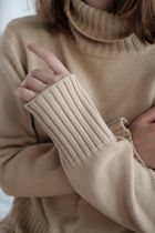 Oat ribbed roll-neck knit, photo by Alena Shekhovtcova on Pexels