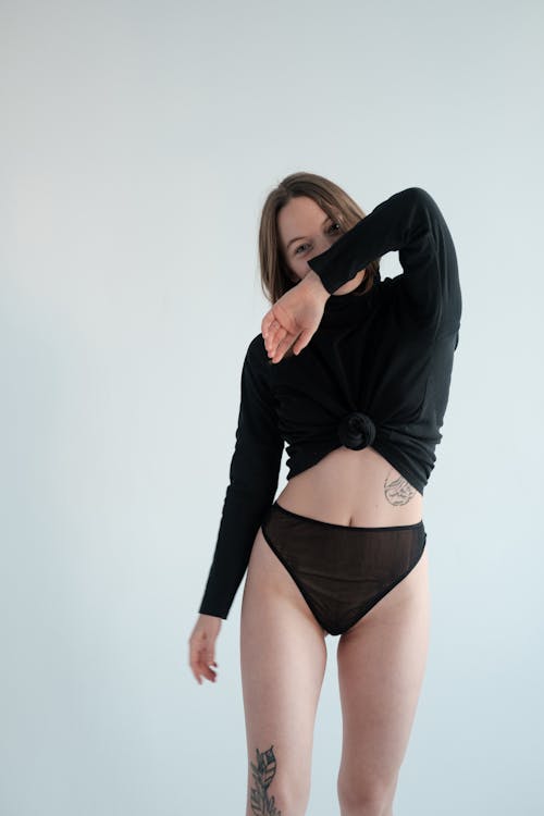 Portrait of Woman in Sweater and Panties Stock Image - Image of
