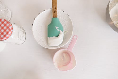 Pink Ice Cream on White Ceramic Bowl