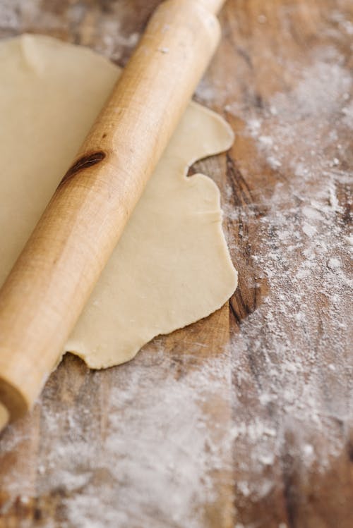 A Rolling Pin on Top of a Dough