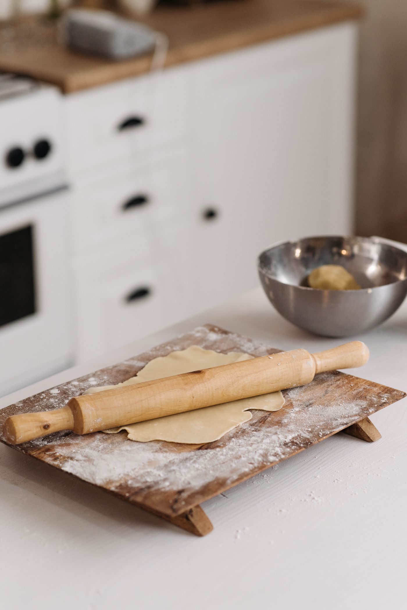 Homemade pastry dough rolled out with a rolling pin