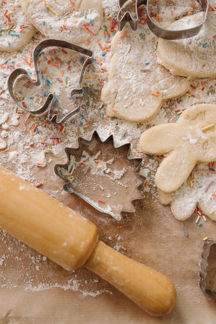 Close Up Of Rolling Pin And Dough Shapes