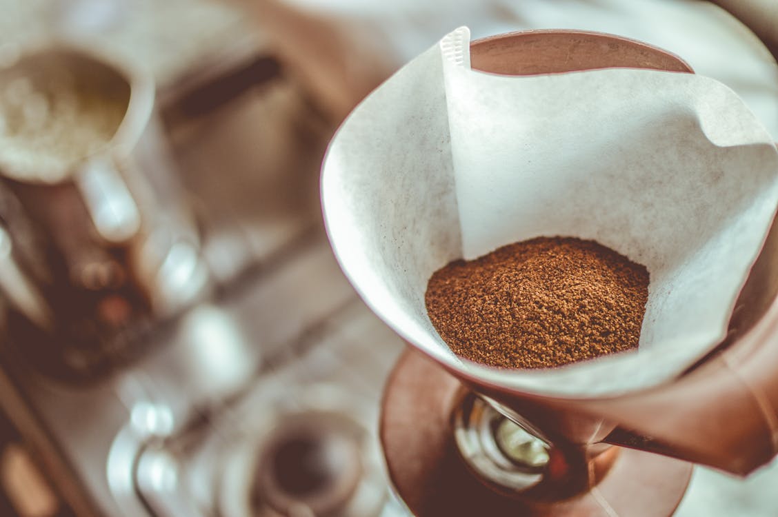 Free Brown Coffee on White Strainer Stock Photo