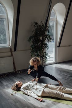 A serene meditation session with incense in an airy indoor studio, promoting wellness and relaxation.