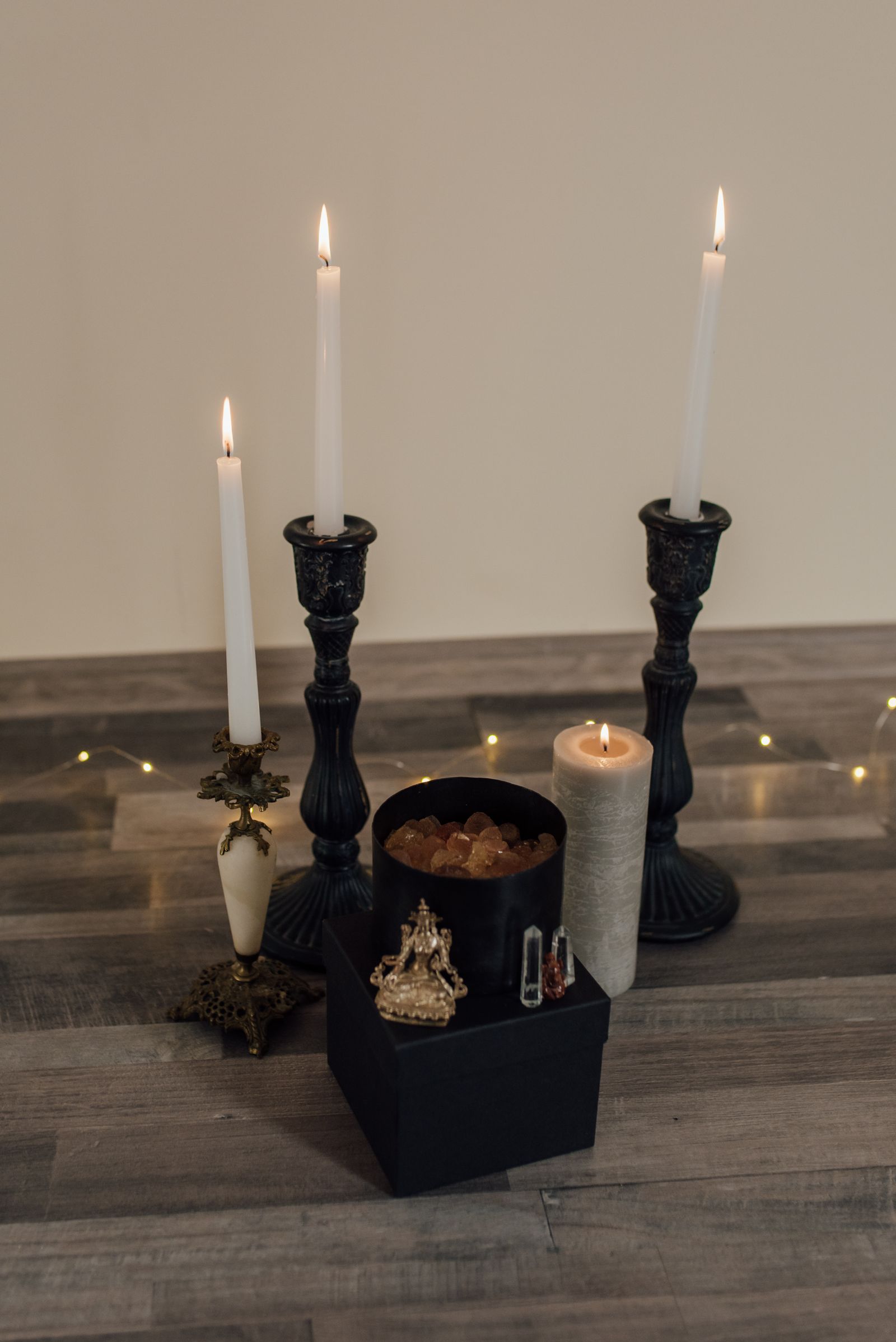 Cluster of lit candles glowing warmly together
