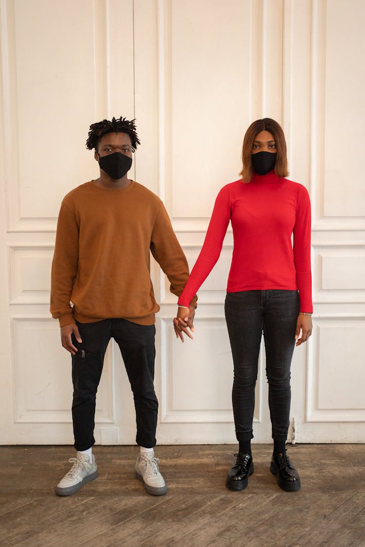 Black Couple In Medical Masks In Room