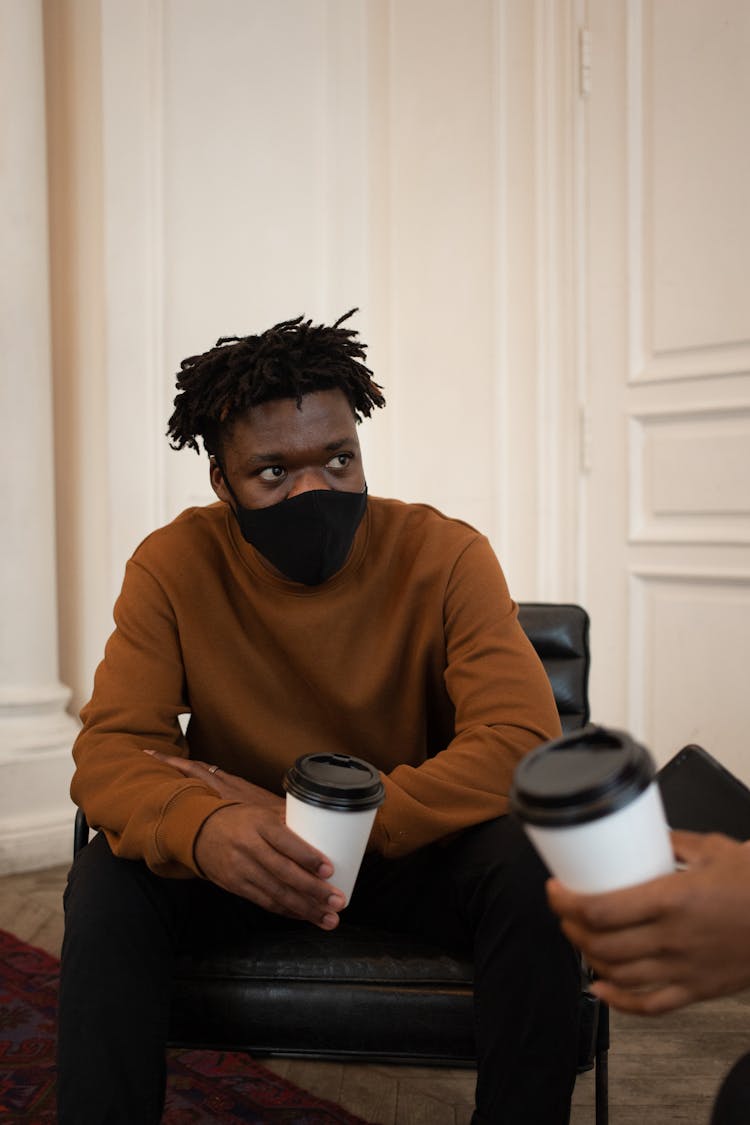 Black Man In Protective Mask With Coffee Talking With Friend