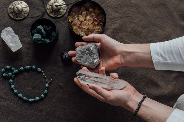 A crystal bracelet held in hands