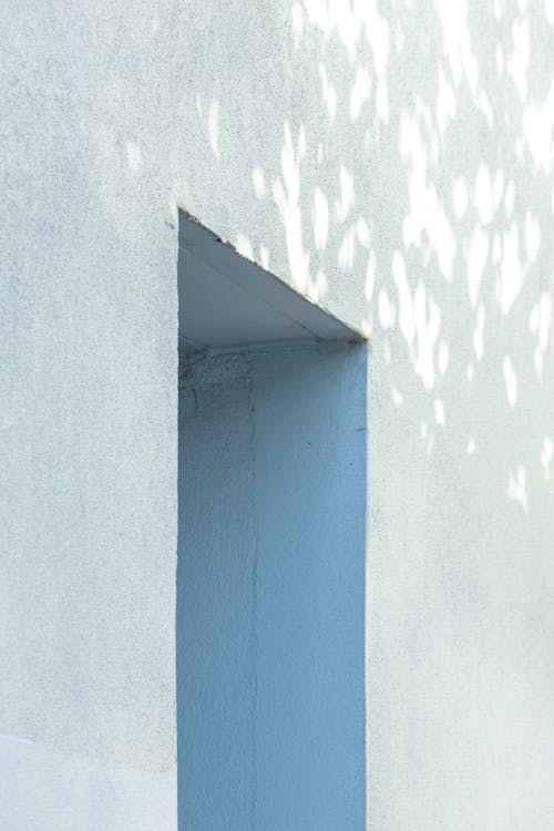 A Rectangular Shape Indentation on a White Rough Wall
