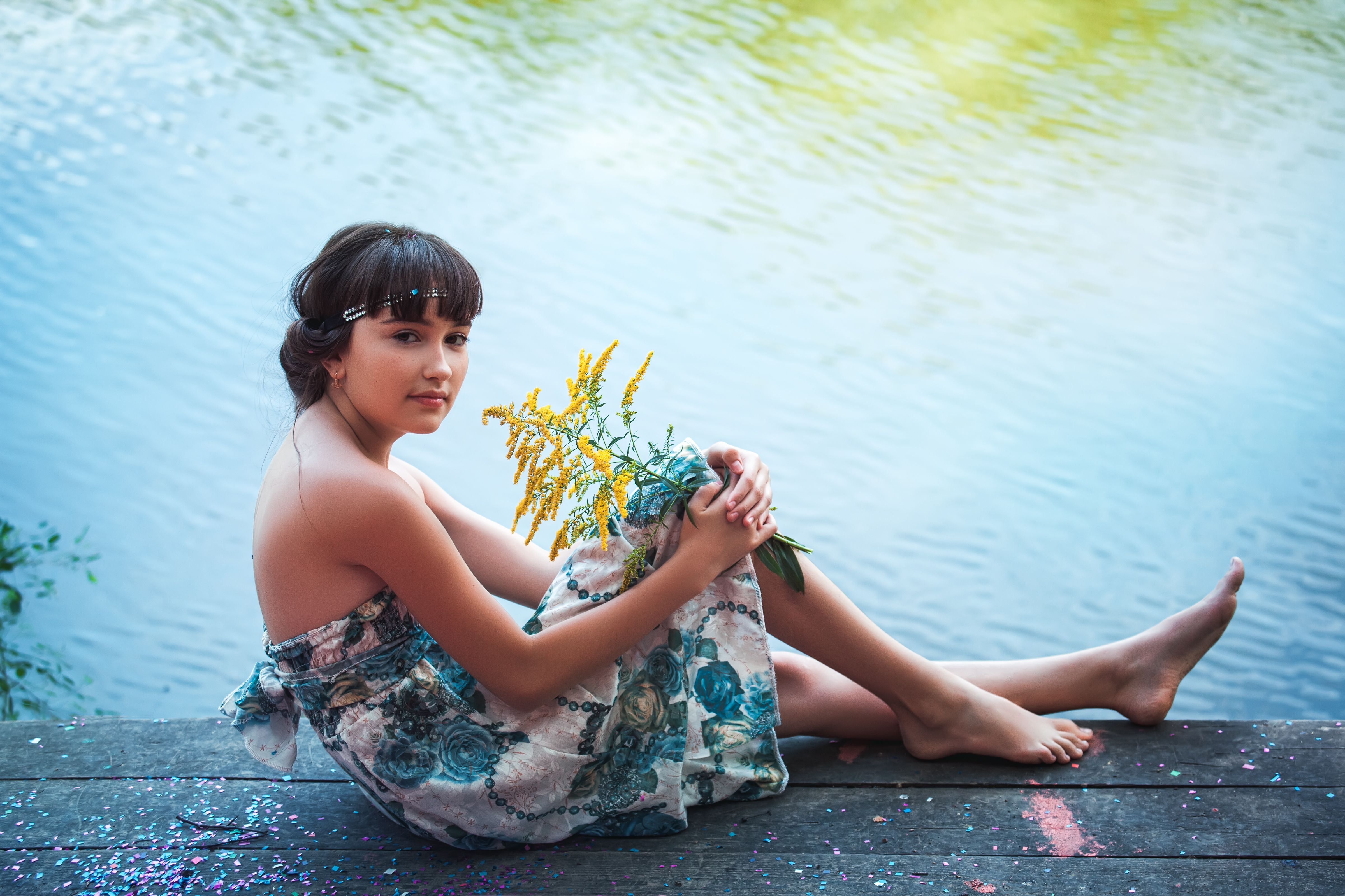 A Woman Wearing a Floral Dress by the Lake · Free Stock Photo