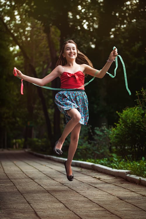 A Woman Running on the Street