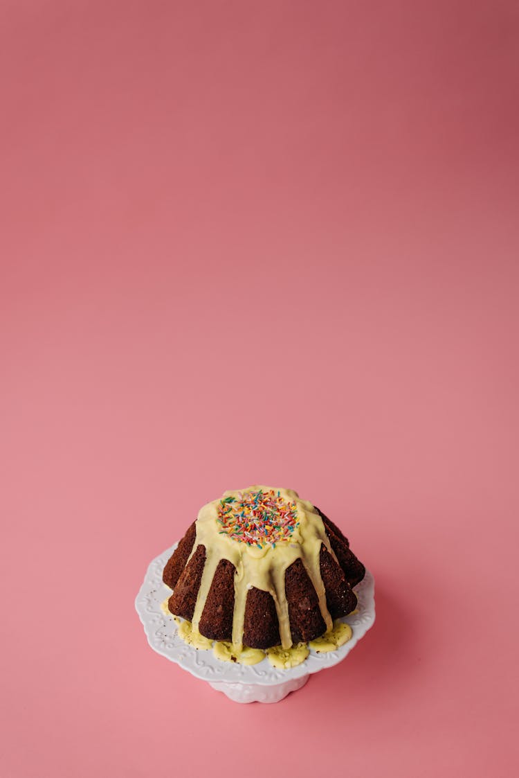 Photo Of A Bundt Cake On A Pink Surface