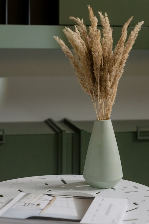 Close Up Shot of Ceramic Vase with Dried Flowers