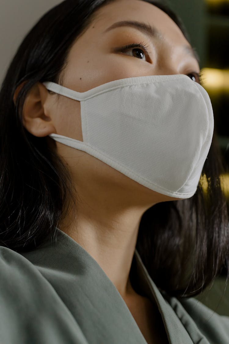 Woman In White Sterile Mask