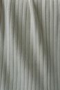 Gray striped fabric placed on table