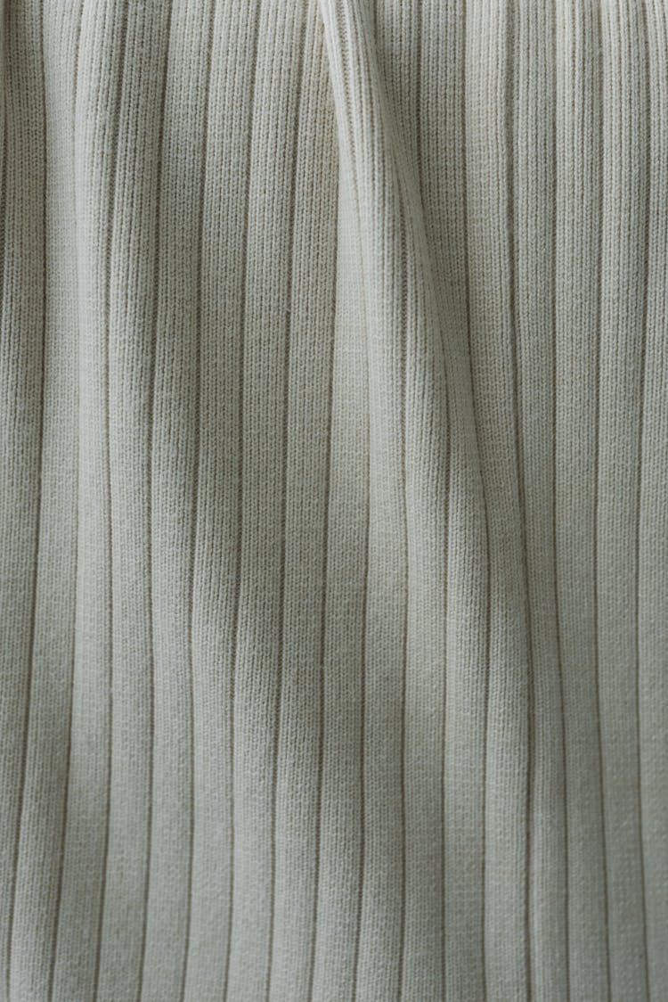 Gray Striped Fabric Placed On Table