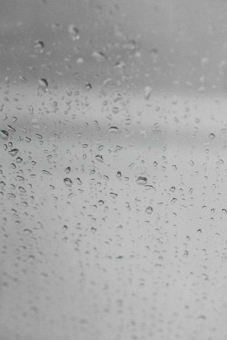 Wet Window During Rain On Gloomy Day