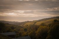 Rolling hills at sunset — James Frid on Pexels