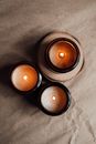 Candle in Brown Glass Containers