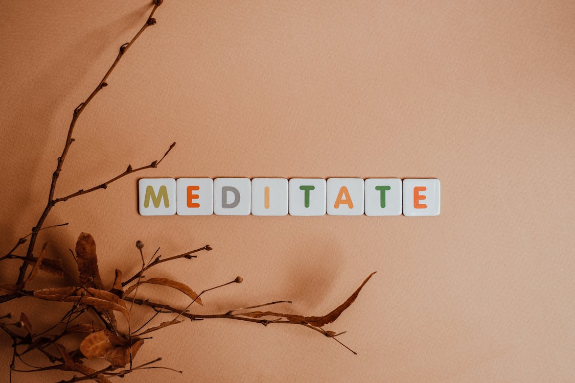 Word Meditate on Letter Tiles