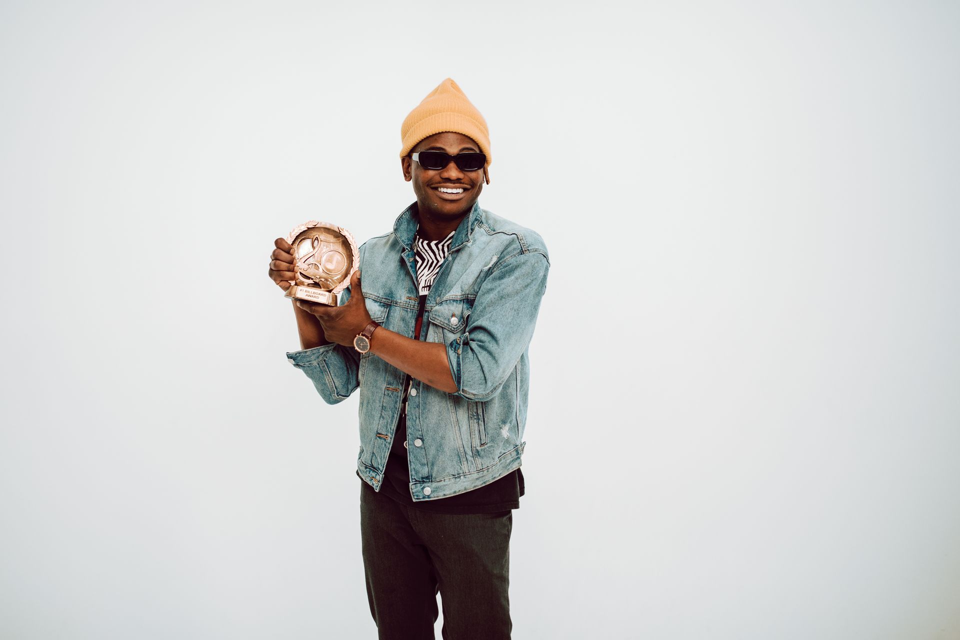 Man Holding a Music Award